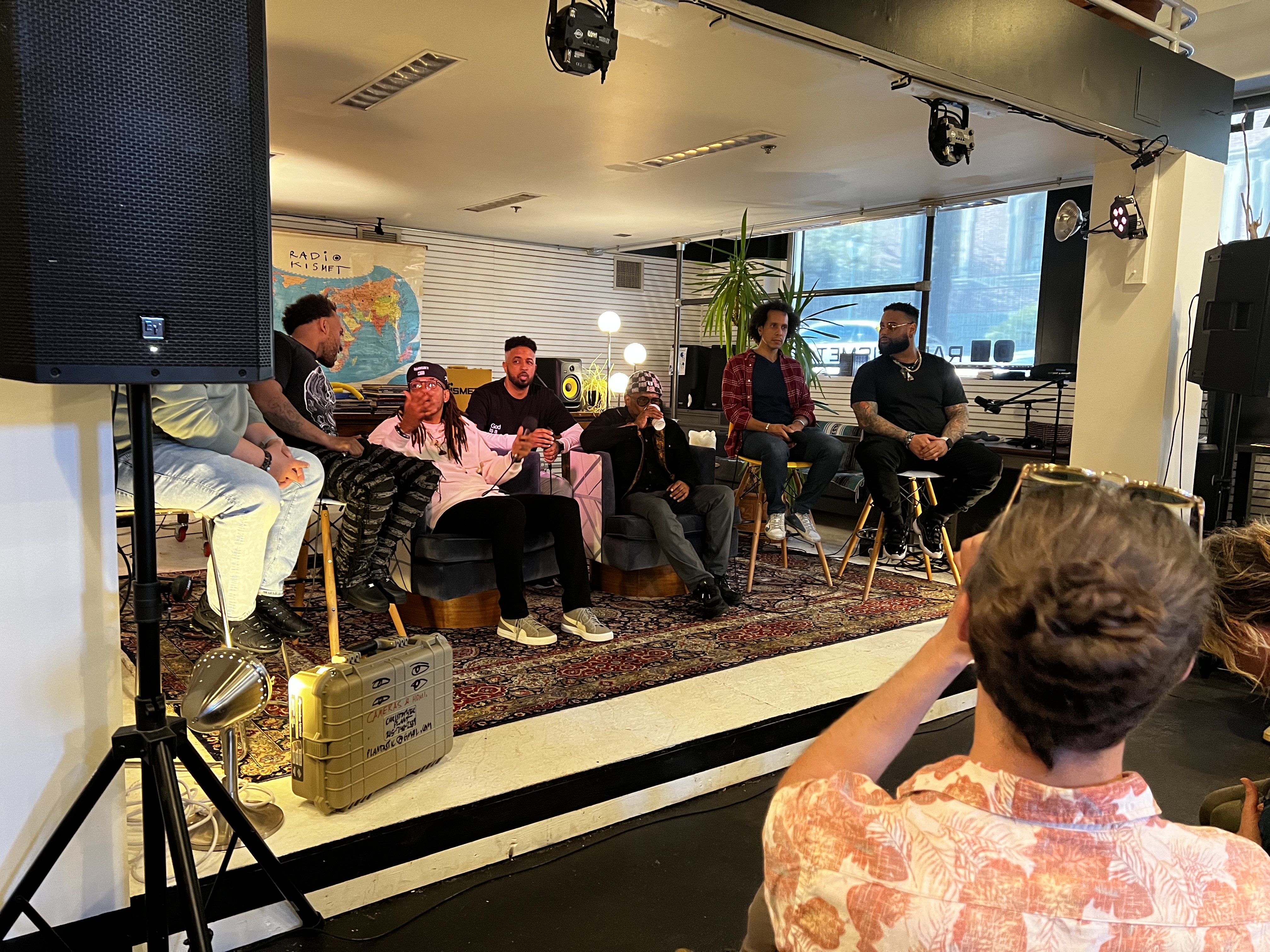 Panel discussion in an intimate indoor studio setting